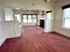 Open-concept living room featuring a fireplace and ample natural light at 160 16Th Ne Ave, St Petersburg, FL 33704