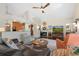 Spacious living room showcases hardwood floors, fireplace, and an open layout at 17503 Edinburgh Dr, Tampa, FL 33647