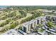 Condominium complex with a golf course and a walking path nearby at 2700 Cove Cay Dr # 5-G, Clearwater, FL 33760