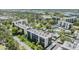 Aerial view of the condominium complex and the community's manicured landscaping at 2700 Cove Cay Dr # 5-G, Clearwater, FL 33760