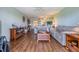 Expansive living room boasting wood floors, tasteful decor, and seamless flow, perfect for both relaxing and entertaining at 2700 Cove Cay Dr # 5-G, Clearwater, FL 33760