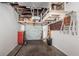 Basement featuring garage door access, laundry and storage hook ups, ladder access to lofted storage at 2736 45Th N Way, St Petersburg, FL 33713