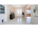 Welcoming foyer features tile flooring, plenty of natural light, and an arched entryway at 2736 45Th N Way, St Petersburg, FL 33713