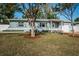 Charming single-story home with a well-manicured lawn, attractive curb appeal, and inviting front entrance at 2736 45Th N Way, St Petersburg, FL 33713