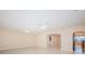 Spacious living room features tile floors and multiple ceiling fans for optimal comfort at 2736 45Th N Way, St Petersburg, FL 33713
