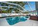 Inviting pool area features a hot tub and outdoor dining space at 2736 45Th N Way, St Petersburg, FL 33713