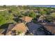 Aerial view of community buildings surrounded by mature landscaping and nearby waterfront at 2934 Lichen Ln # D, Clearwater, FL 33760