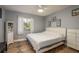 Bedroom features tile flooring, ceiling fan and natural light at 2934 Lichen Ln # D, Clearwater, FL 33760