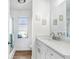 Updated bathroom featuring single vanity, quartz countertop, and tile flooring at 303 Cranston Pl, Sun City Center, FL 33573