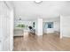 Spacious living room with a view, modern furnishings, and open floor plan at 303 Cranston Pl, Sun City Center, FL 33573