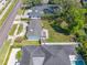 Overhead view of property featuring large yard and neighborhood layout at 3310 W Swann Ave, Tampa, FL 33609