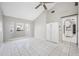 Bright bedroom with high ceilings, neutral tones, and ample natural light at 3310 W Swann Ave, Tampa, FL 33609