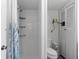 Bathroom featuring a walk-in shower with curtains and a toilet with storage at 39142 Kendell Dr, Zephyrhills, FL 33542