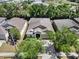 An aerial view of the home shows the roof, yard, and surrounding neighborhood at 405 Laguna Mill Dr, Ruskin, FL 33570