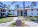 Inviting two-story condo complex with well-manicured landscaping at 5019 Mill Pond Rd # 3128, Wesley Chapel, FL 33543