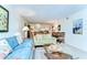 Bright living room with a chandelier, comfortable seating, and an open floor plan at 5019 Mill Pond Rd # 3128, Wesley Chapel, FL 33543