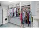 Walk-in closet with custom shelves and organizers, and front load washer/dryer at 5203 Bayshore Blvd # 10, Tampa, FL 33611