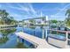 Well-kept private boat dock with lift provides easy access to waterway at 5208 Denver Ne St, St Petersburg, FL 33703