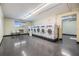 A clean, well-lit laundry room with multiple washing machines and seating at 5820 N Church Ave # 148, Tampa, FL 33614