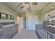 Bright Bedroom features soft green walls, carpet, and a grey wooden baby crib at 6338 Springline Pl, Apollo Beach, FL 33572