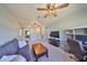 Spacious bonus room with a ceiling fan, comfortable seating, and a workstation at 6338 Springline Pl, Apollo Beach, FL 33572