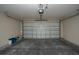 Spacious two-car garage with automatic door, offering ample storage and parking at 6527 Grapewood Rd, Spring Hill, FL 34609