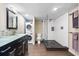 Bathroom with a walk-in shower, vanity, stackable washer and dryer at 7200 Sunshine Skyway S Ln # 16G, St Petersburg, FL 33711