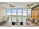Bright living room with expansive windows offering stunning waterfront views at 7200 Sunshine Skyway S Ln # 16G, St Petersburg, FL 33711