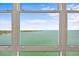 Breathtaking water view through large windows, offering scenic views of the coastline at 7200 Sunshine Skyway S Ln # 16G, St Petersburg, FL 33711
