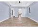 Large bedroom featuring recessed lighting, sliding glass door, and two entries to other areas of the home at 9514 Snapper Cir, Port Charlotte, FL 33981