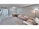 Comfortable living room with neutral color palette, perfect for relaxing and entertaining at 9526 Newdale Way # 101, Riverview, FL 33578