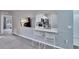 Bright living space with bar seating, views to the kitchen, and comfortable furnishings at 9526 Newdale Way # 101, Riverview, FL 33578