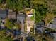 An aerial view shows the home's layout and features: a brick patio and storage shed at 9914 Sir Frederick St, Tampa, FL 33637