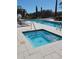 Relaxing hot tub by the pool, perfect for unwinding and enjoying the serene surroundings at 10200 Gandy N Blvd # 235, St Petersburg, FL 33702