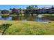 Scenic view of the pond with fountain feature and surrounding buildings at 10200 Gandy N Blvd # 235, St Petersburg, FL 33702