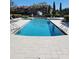 Beautiful community pool with a fountain and plenty of space for relaxation and recreation at 10200 Gandy N Blvd # 235, St Petersburg, FL 33702