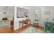 Bright office features a desk with windows at 12404 Sunshine Ln, Treasure Island, FL 33706