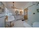 Stunning bathroom with a soaking tub, glass enclosed shower, and double vanity at 1439 Wetherington Way, Palm Harbor, FL 34683