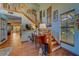 Open foyer with wood staircase and flooring providing an inviting entrance at 1439 Wetherington Way, Palm Harbor, FL 34683