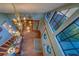 Grand foyer featuring high ceilings, large windows, and elegant decor at 1439 Wetherington Way, Palm Harbor, FL 34683