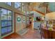 Inviting foyer with wood floors, staircase, and abundant natural light at 1439 Wetherington Way, Palm Harbor, FL 34683