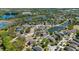 Aerial view of a lakeside neighborhood in Spring Hill, Florida at 15616 Greyrock Dr, Spring Hill, FL 34610