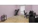 Bedroom featuring carpet, pink walls, and a treadmill at 15616 Greyrock Dr, Spring Hill, FL 34610