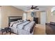 Cozy bedroom with a comfortable bed, stylish furnishings, and soft carpet flooring, perfect for relaxation and rest at 15616 Greyrock Dr, Spring Hill, FL 34610