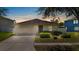 Charming single-story home with a well-maintained lawn, two-car garage, and welcoming curb appeal at 15616 Greyrock Dr, Spring Hill, FL 34610