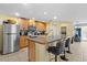 Kitchen featuring stainless steel appliances, granite countertops, and tile floors at 15616 Greyrock Dr, Spring Hill, FL 34610