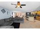 Open floor plan showcasing the living room, dining area, and kitchen, promoting a sense of togetherness and flow at 15616 Greyrock Dr, Spring Hill, FL 34610