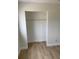 Bedroom closet with light-colored wood flooring at 1606 Marilyn Ave, Bradenton, FL 34207