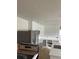 Modern kitchen featuring stainless steel appliances, white cabinetry, and ample counter space at 1606 Marilyn Ave, Bradenton, FL 34207