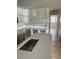 Bright kitchen featuring new white cabinets and countertops, ready for appliances and finishing touches at 1606 Marilyn Ave, Bradenton, FL 34207